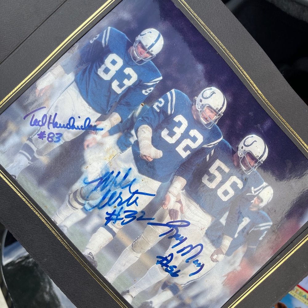 Colts helmet and picture signed